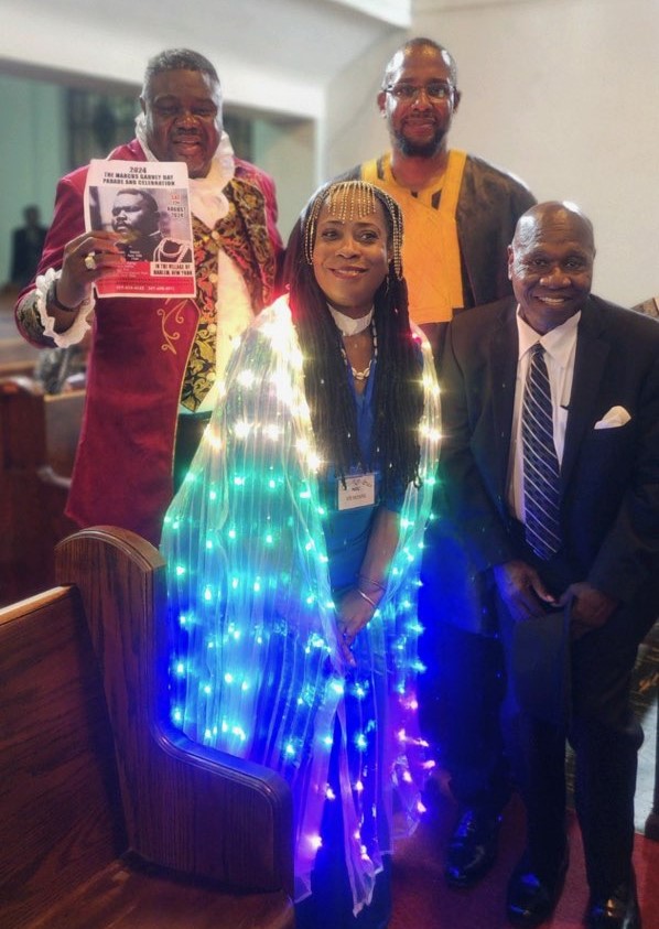 Braxton Vanzant and Anita Belle with Malik Z. Shabazz, Conductor of the Afrodescendant Nation
