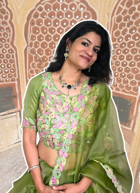 Woman wearing statement necklace and earrings from Iridezza Fusion Looks Jaipur Edit.