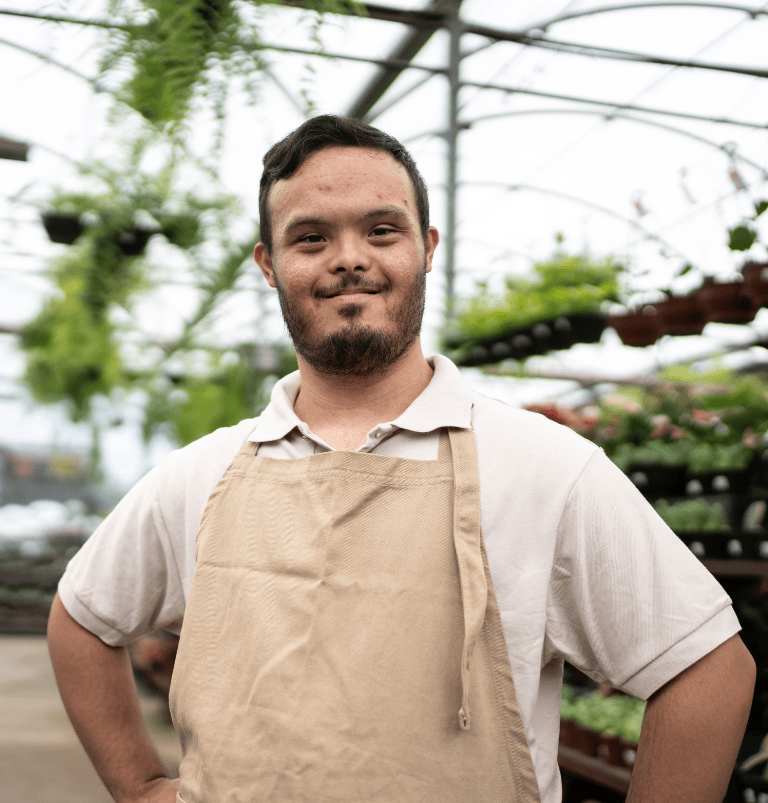 Disabled Adult Male in a greenhouse