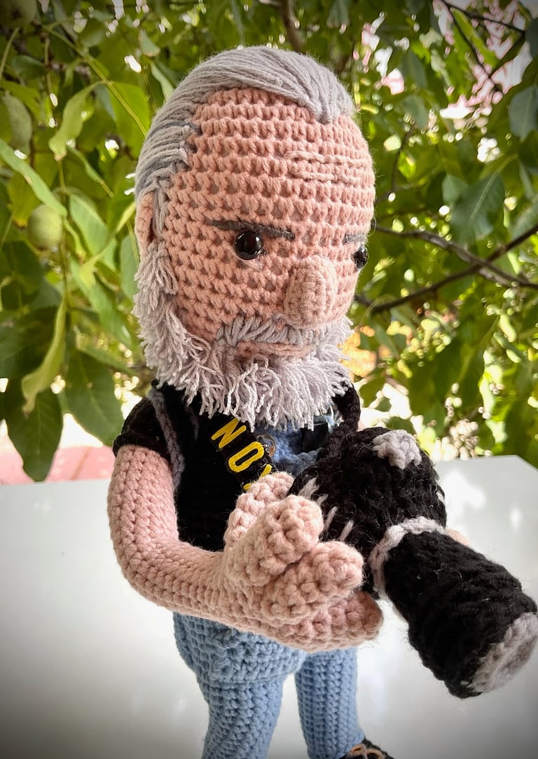 handcrafted knit photographer doll