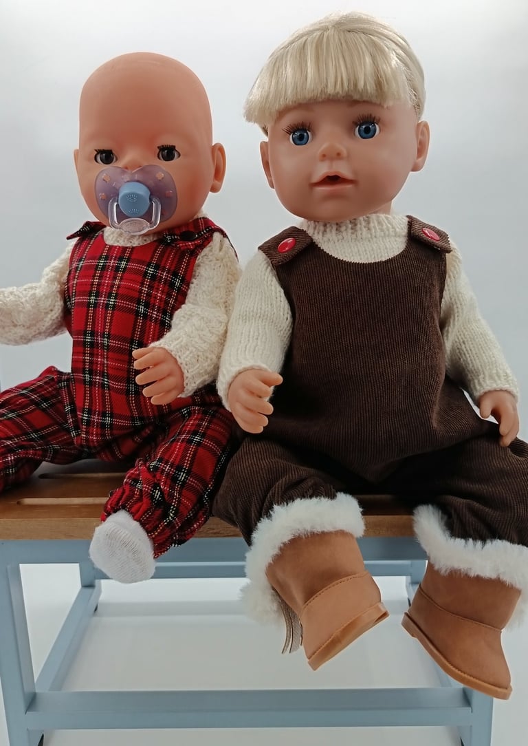 Baby Born and Big Sister dolls dressed in tartan and corduroy overalls