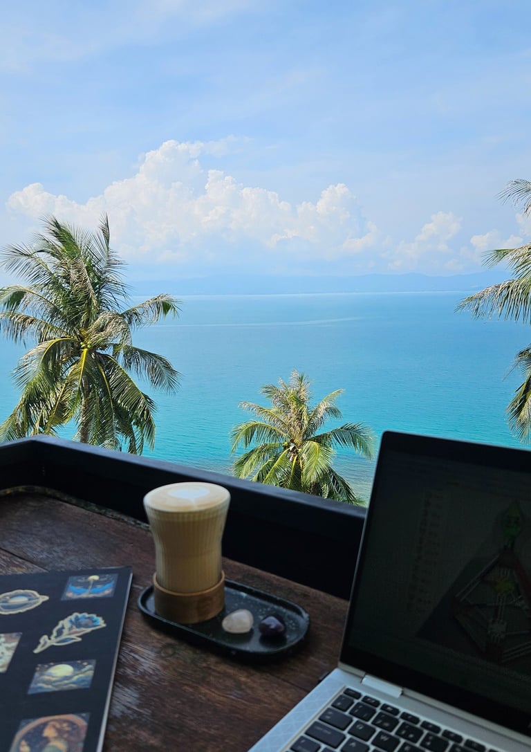 remote work laptop looking to the ocean tropical