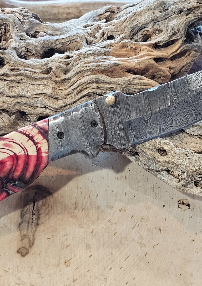All knives are handcrafted Damascus Blades.