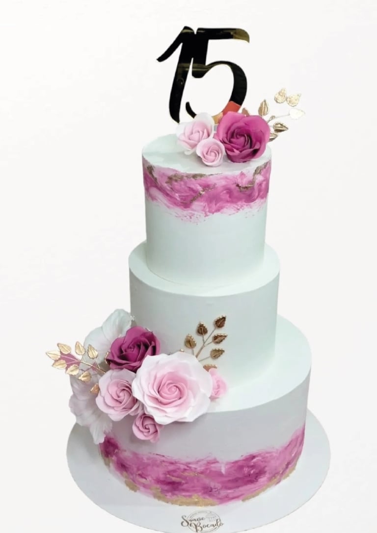 a cake with a number of flowers on it