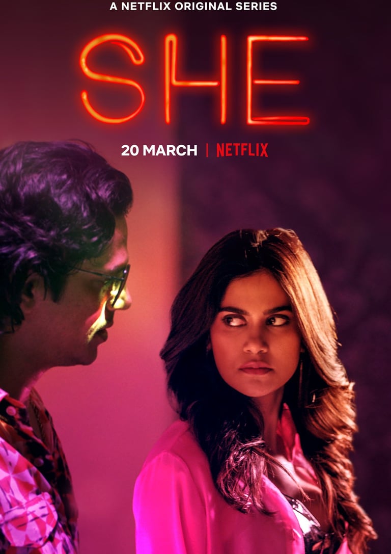a man and woman standing next to each other in a movie poster