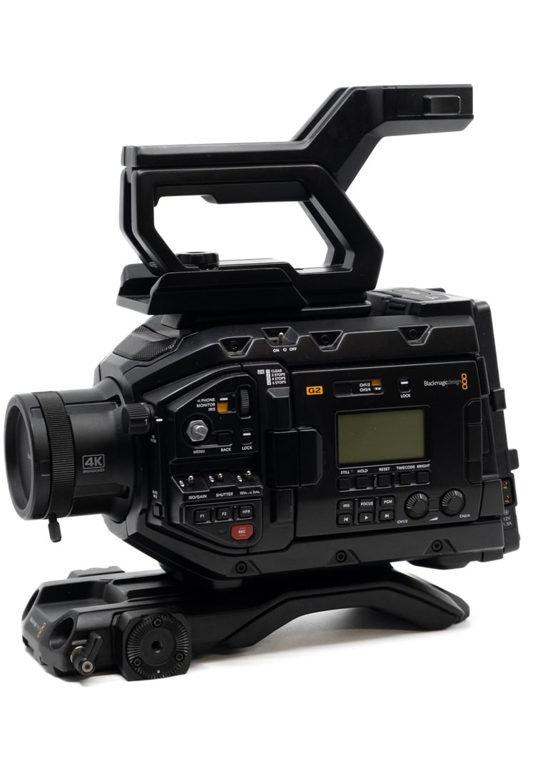 Professional Blackmagic URSA Mini Pro 4.6K digital cinema camera with top handle on white background.
