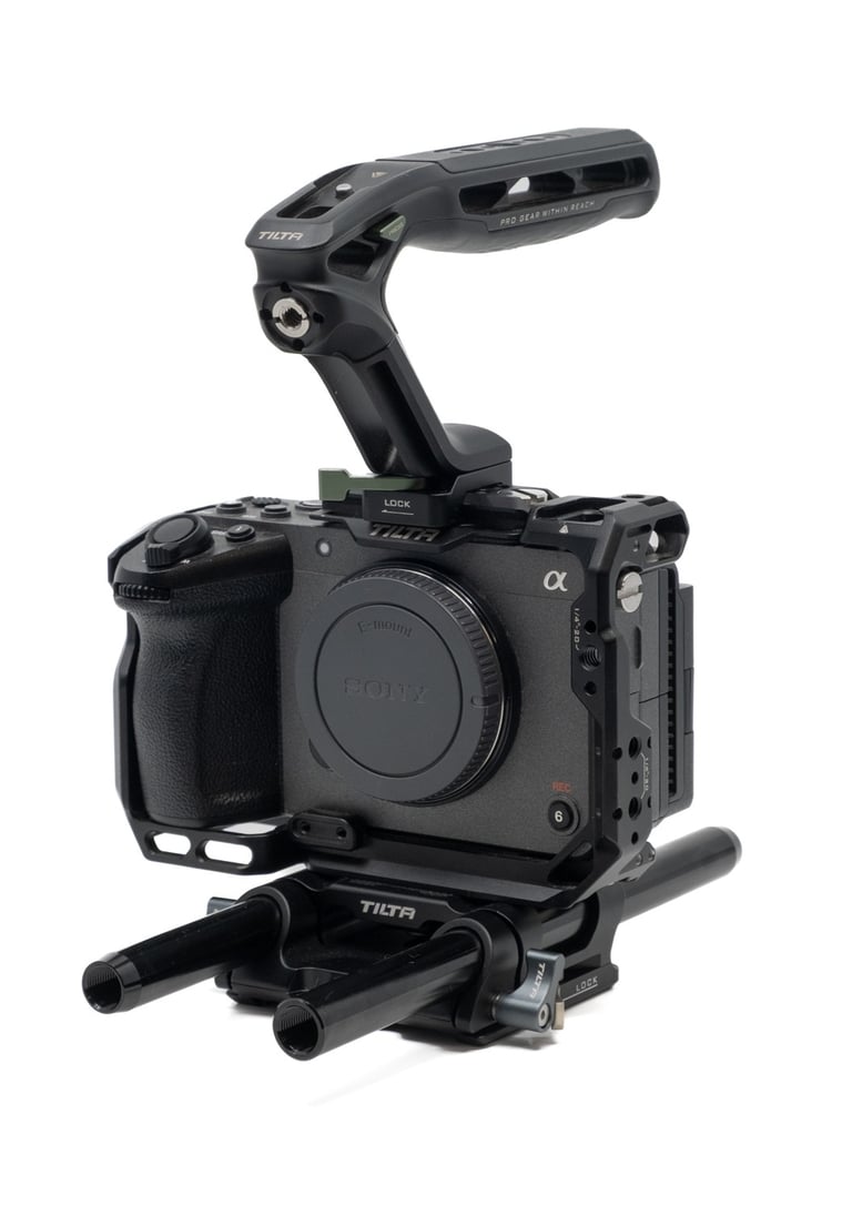 Sony FX3 cinema camera inside a Tilta full cage with top handle and 15mm rod baseplate.