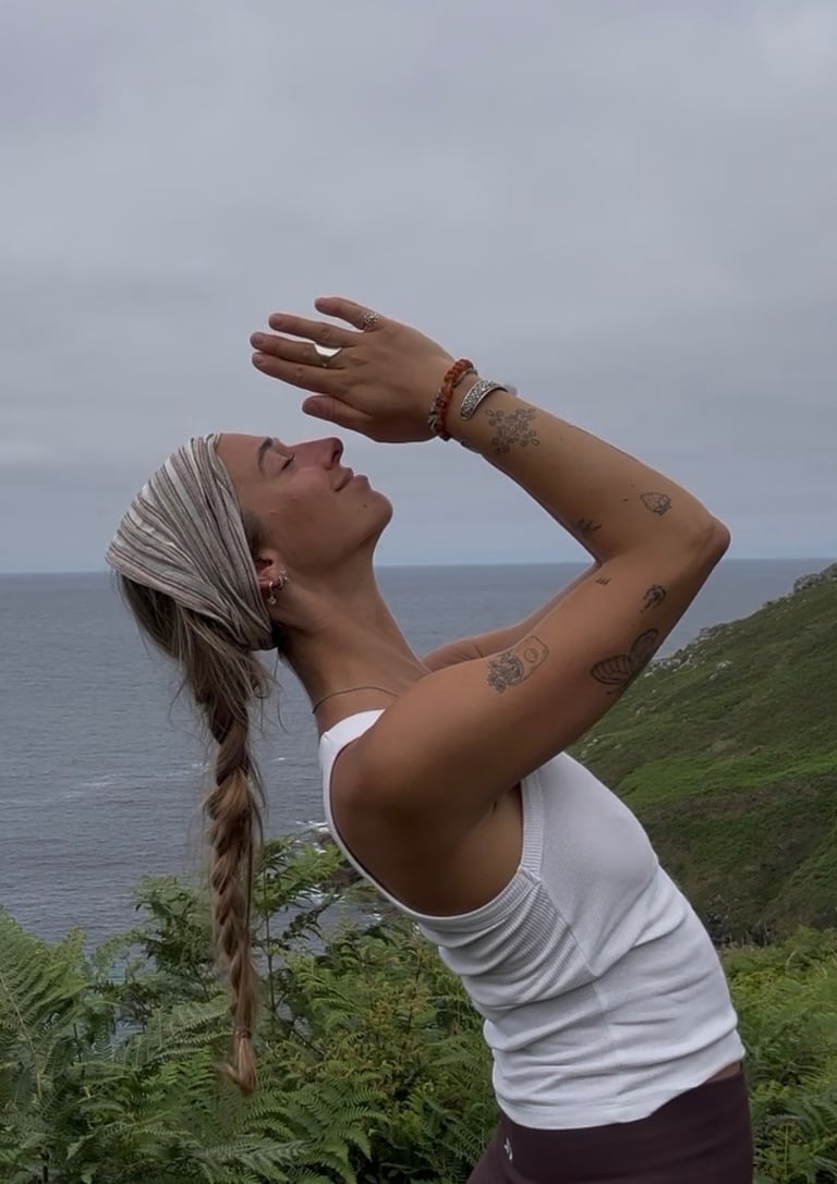 Yoga teacher Jean performing Anjali Mudra in Nature