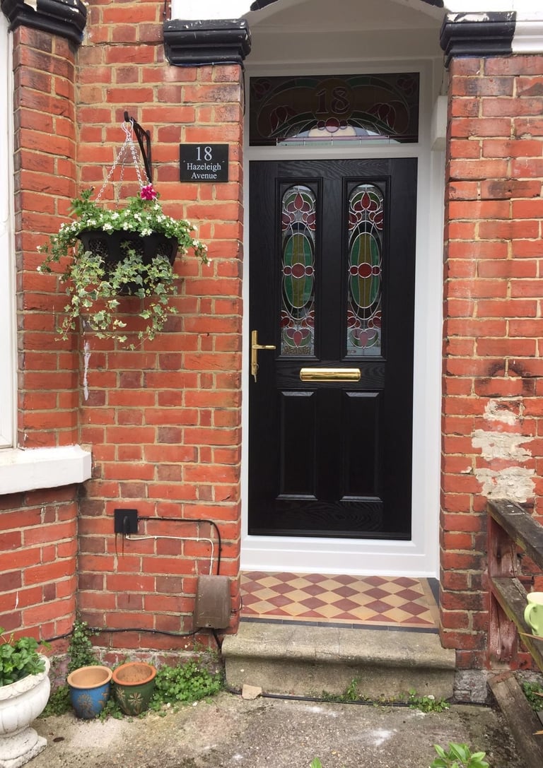 new black front door with bespoke glass which was fitted in Woolston, Southampton by Buildmydoor