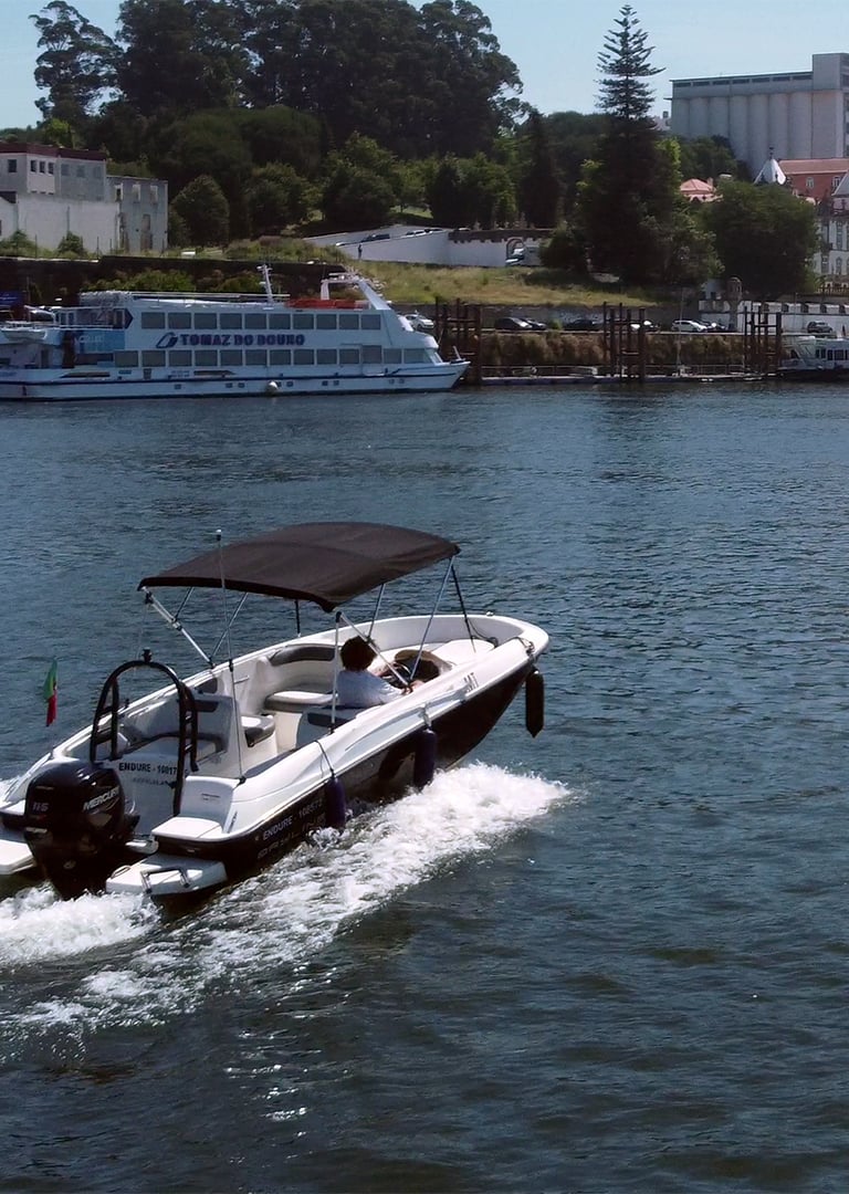 The Endure speedboat cruising on the Douro River