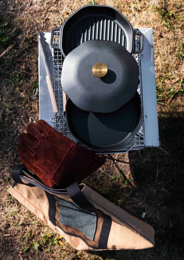 Wild Rover's Fire Cooking Upgrade Package. Cast Iron pan with Fire Gloves and a Snow Peak Takibi