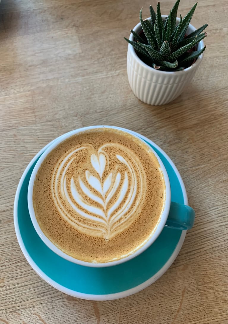 flat white with barista art