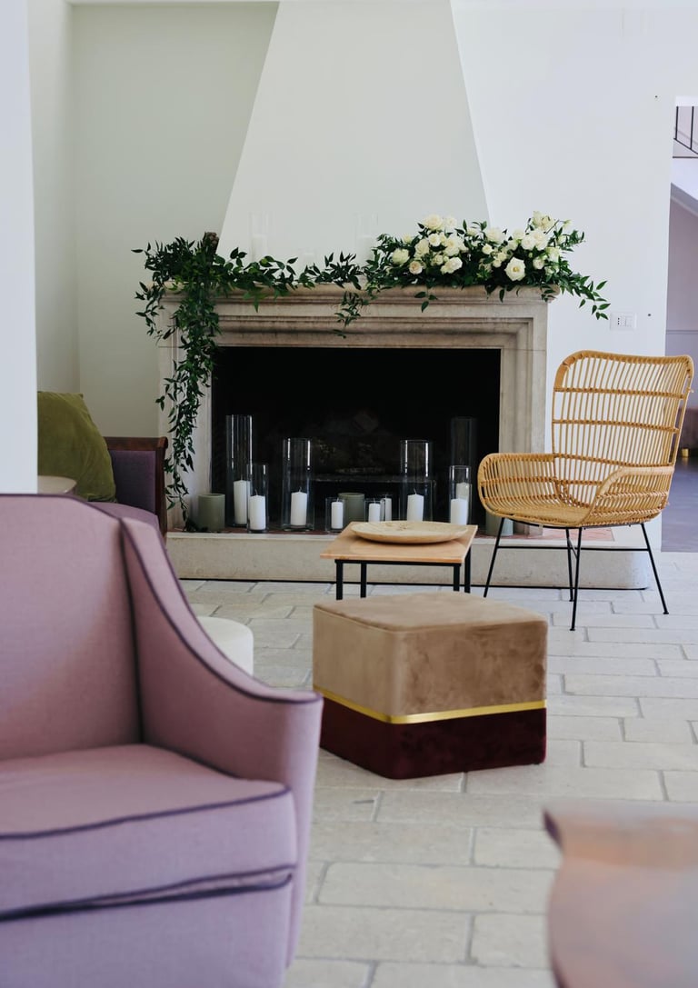 a living room with a fireplace and a chair
