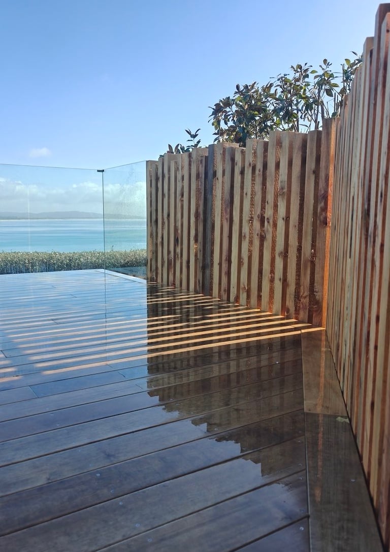 Custom macrocarpa balustrade Langs Beach - CHR Builders