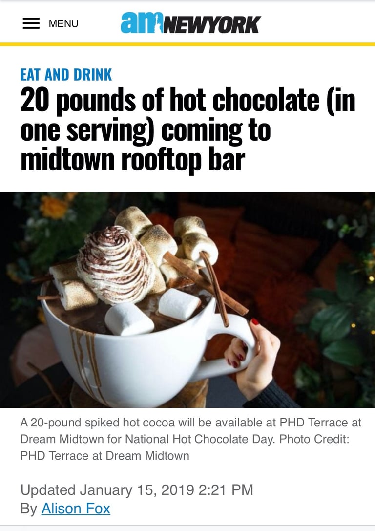 a person holding a cup of coffee and a cup of coffee