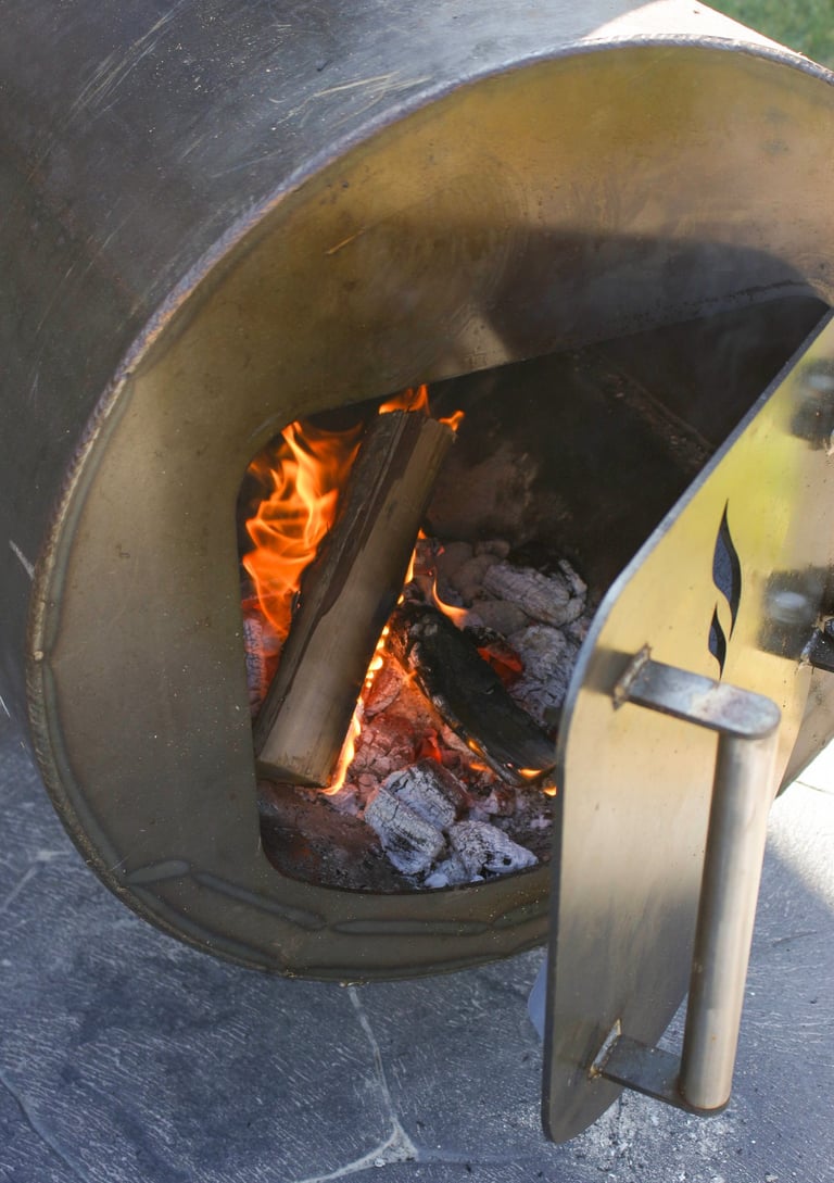 fire inside a rawsteelco Offset smoker that was built in nz