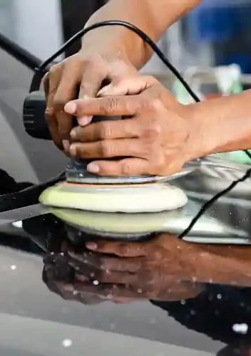 San Antonio paint correction done right on the hood of a black car