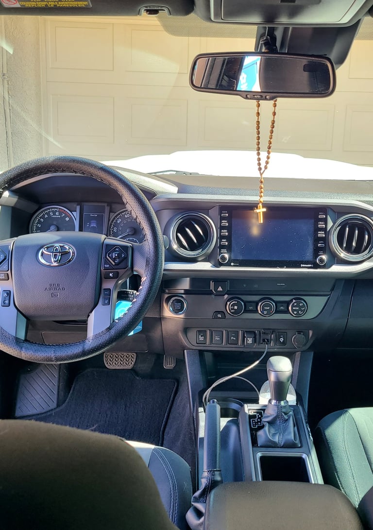Truck interior shining in the morning sun after receiving an interior detail with steam cleaning
