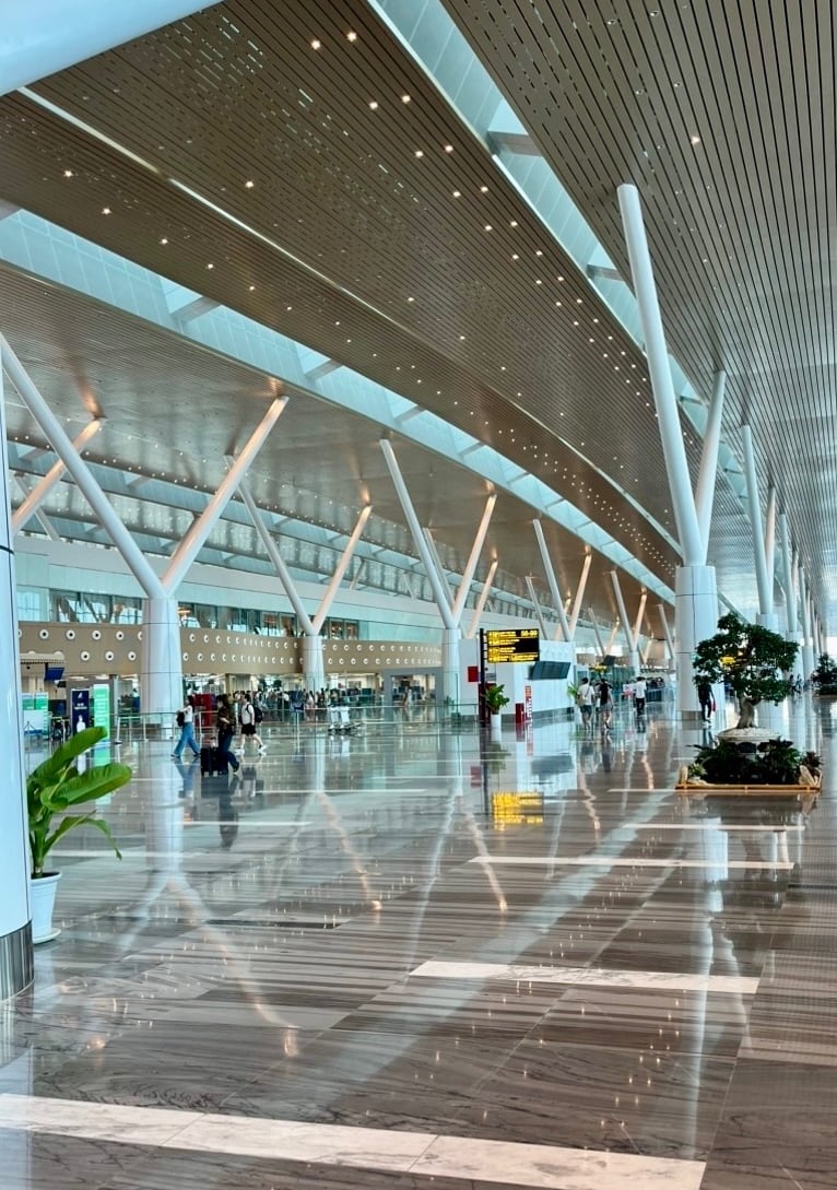 Travellers inside the domestic airport terminal in Vietnam