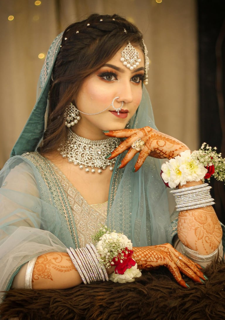 Engagement ceremony makeup with peach tones and subtle glow