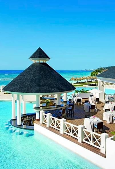 tropical beach hut over the water
