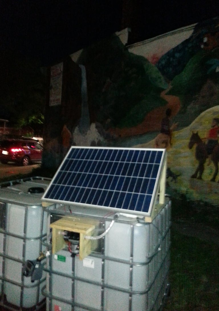 Solar powered IBC tote rainwater system in Boston MA