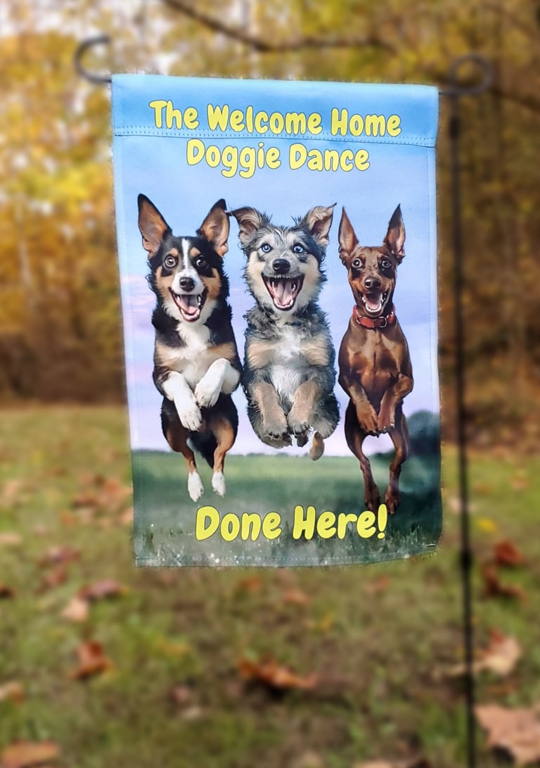 A garden flag picturing three happy dogs jumping and "the welcome home happy dance done here!".