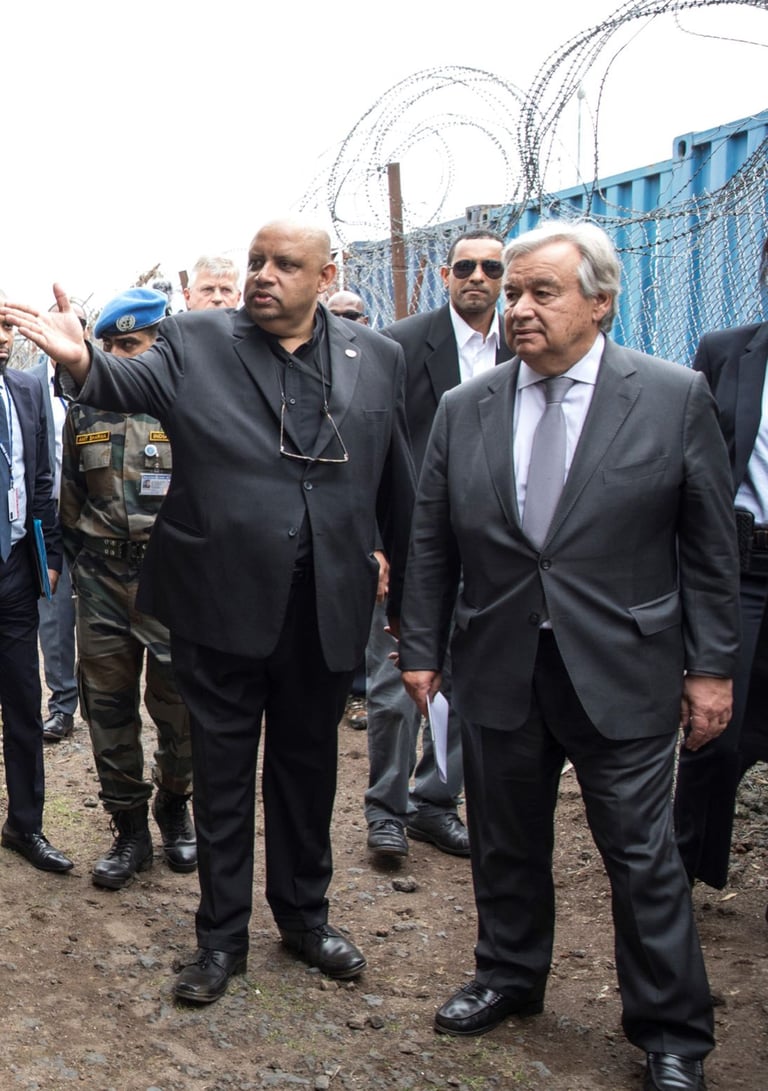 Former senior UN official Bruno Donat with UN Secretary-General in Munigi, DR Congo, circa 2019