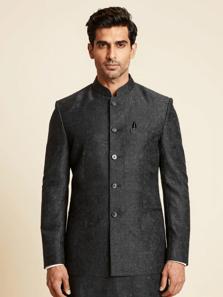 Close-up of a finely embroidered sherwani sleeve showcasing intricate craftsmanship.