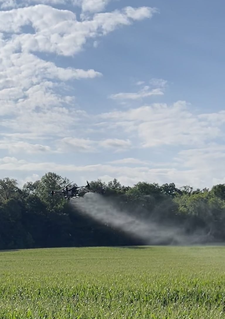Hutch Drone Pro flying a dji T40 Crop Drone Spraying Fungicide on Corn 