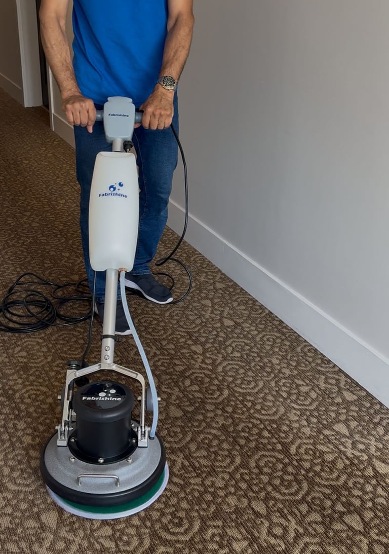 Carpet shampooing stain removal