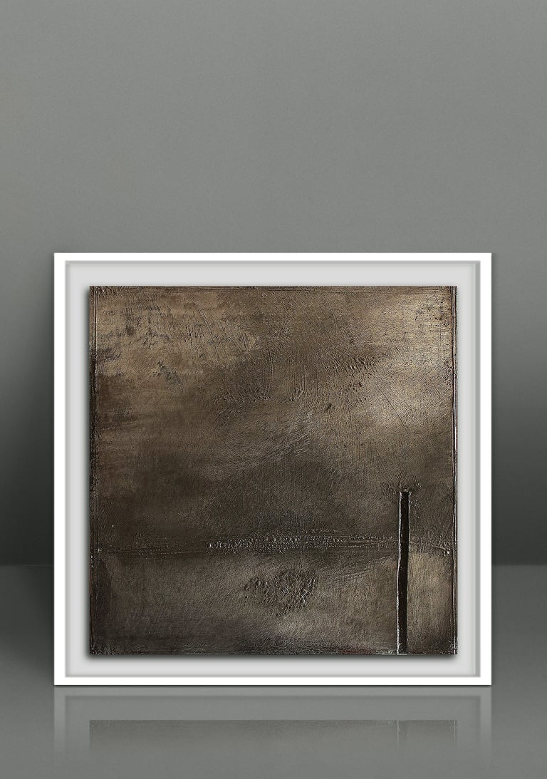 Minimalist bronze textured abstract wall art in a modern white frame against a grey background.