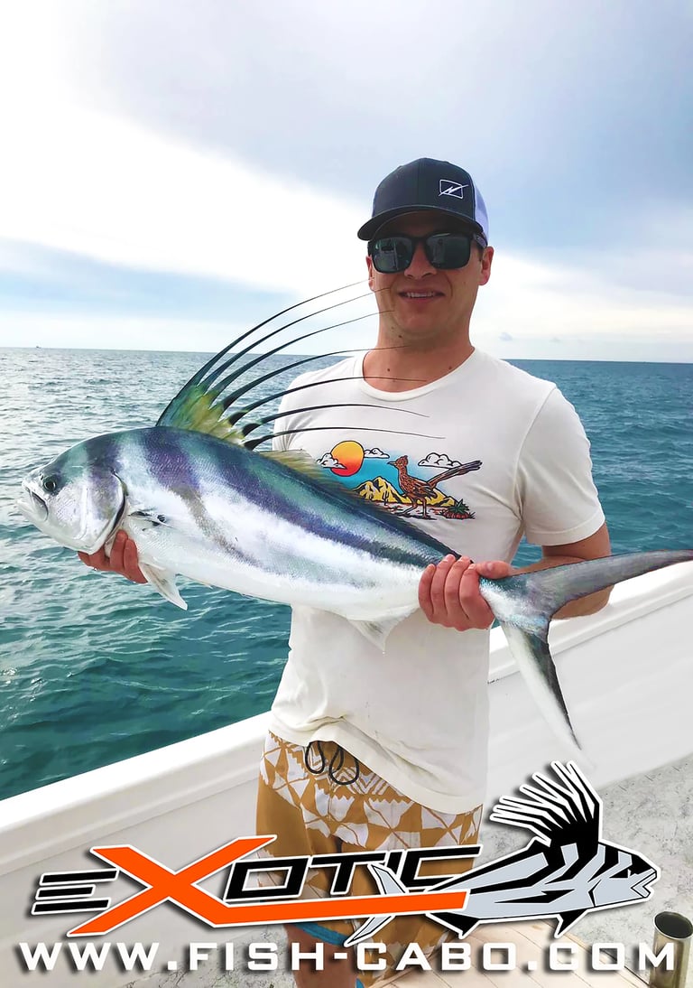 a man holding a fish fish on a boat