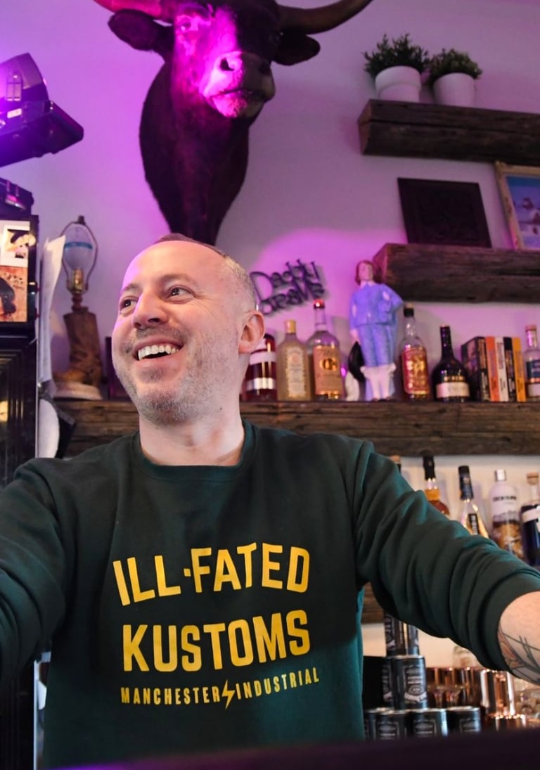 Dan Clapson behind the bar at The Prairie Emporium, a Calgary event space that he co-owns.