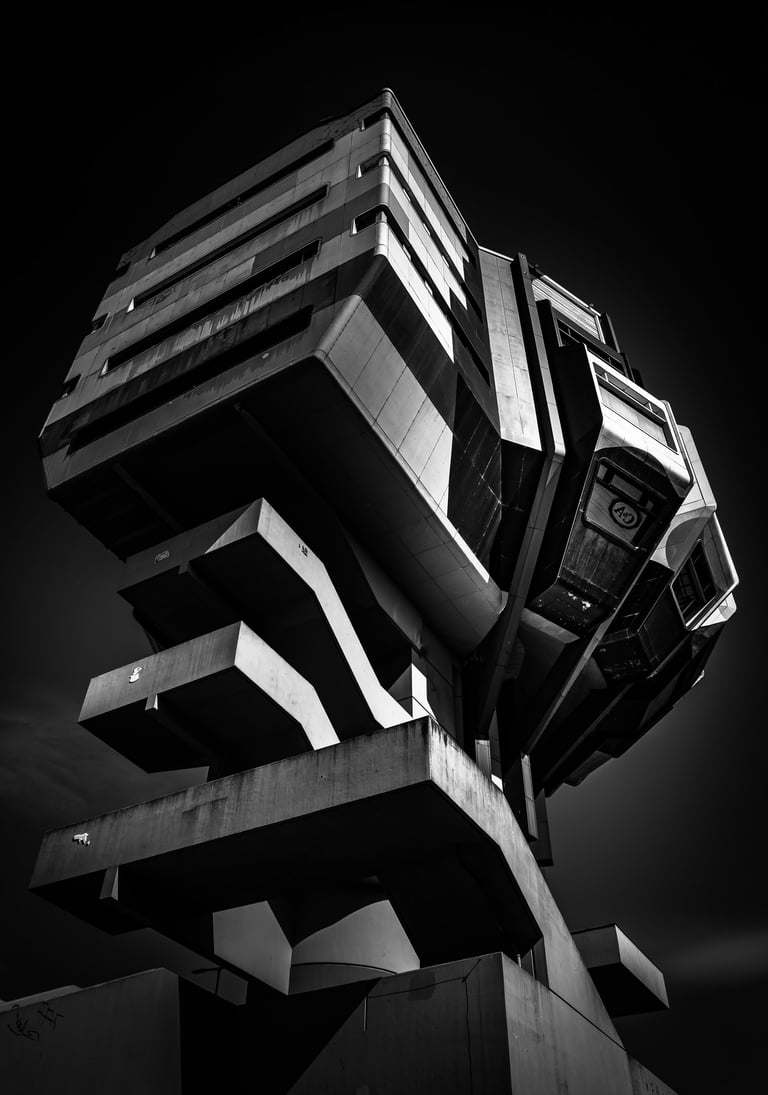 Dark angular brutalist architecture by Martin Wacker, deep moody shadows and sharp geometric lines.