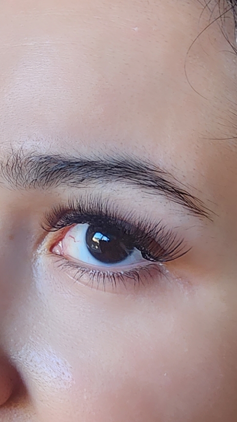 a woman with a toothbrush and a toothbrush in her hand