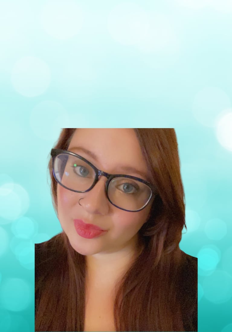 a woman with glasses and a blue background