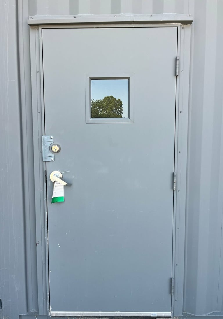 Pass through door on a grey container