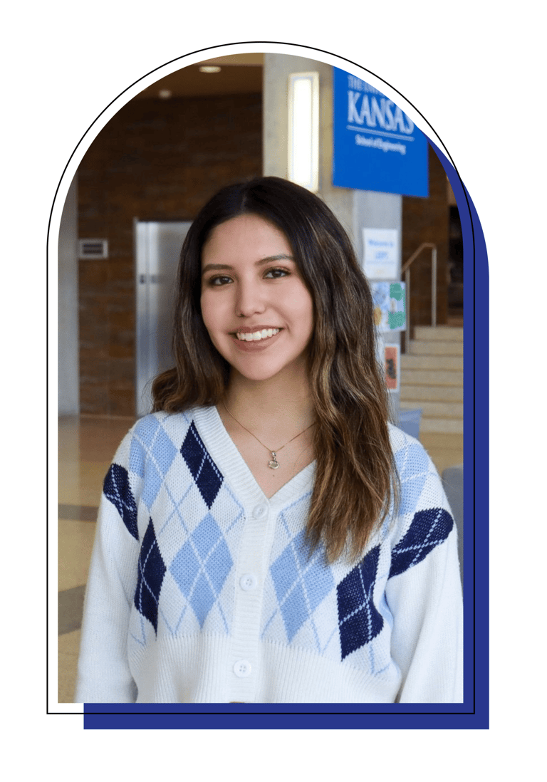 a woman in a blue and white sweater