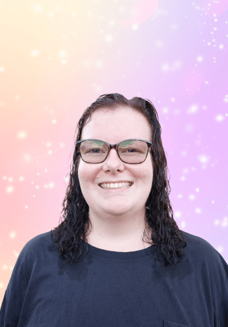 a woman with glasses and a black shirt