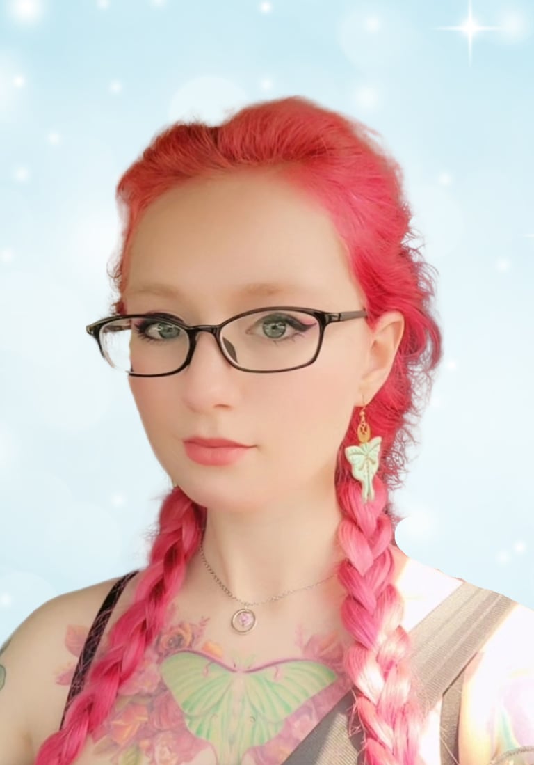 a woman with pink hair and glasses on her face