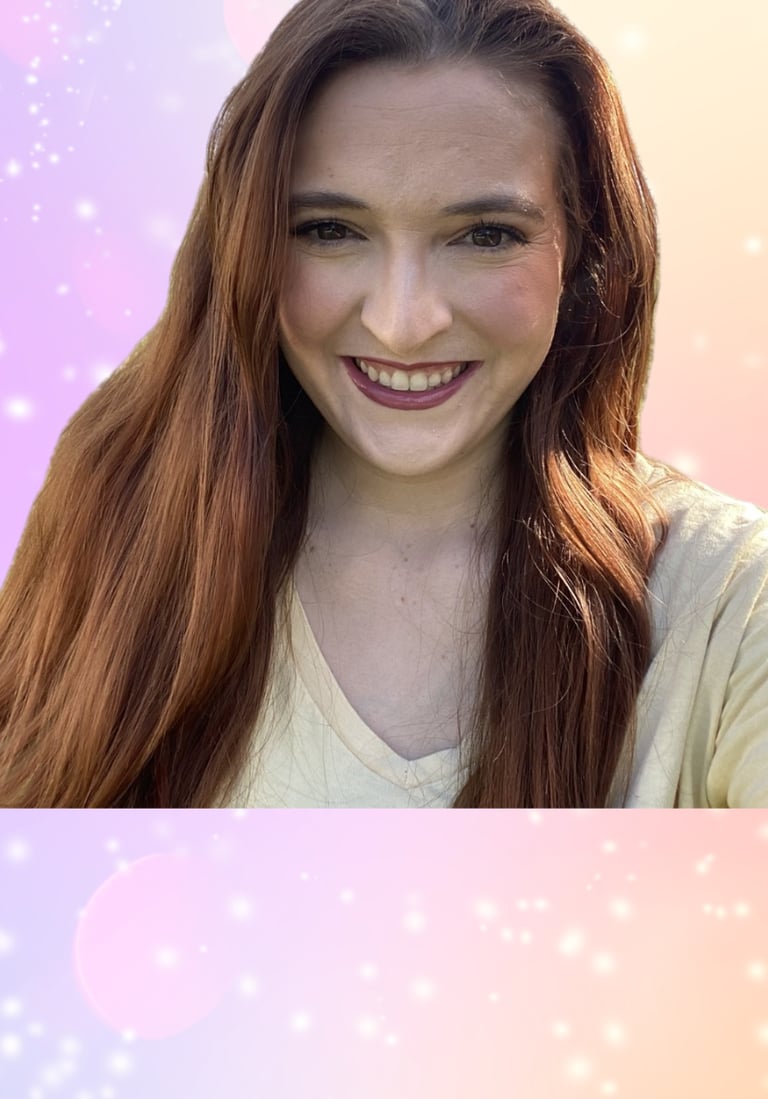 a woman with long hair and a smile on her face