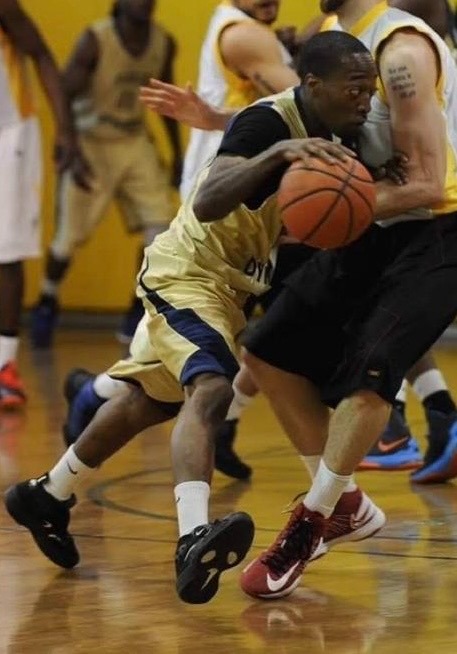 Coach Quaid George Playing Basketball