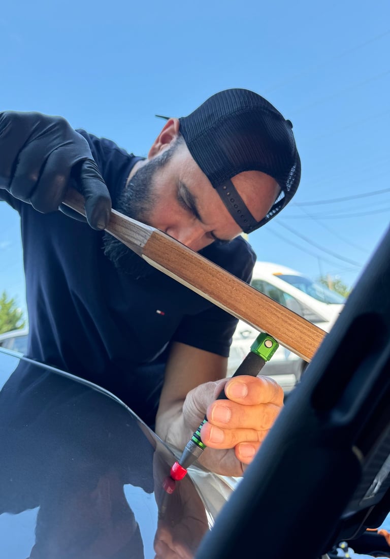 Our skilled technicians strive for customer satisfaction; Mrs. Sam expertly knocks the dent down.