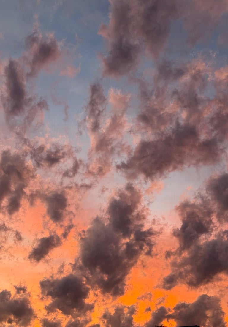 Calming sunset sky with wispy clouds