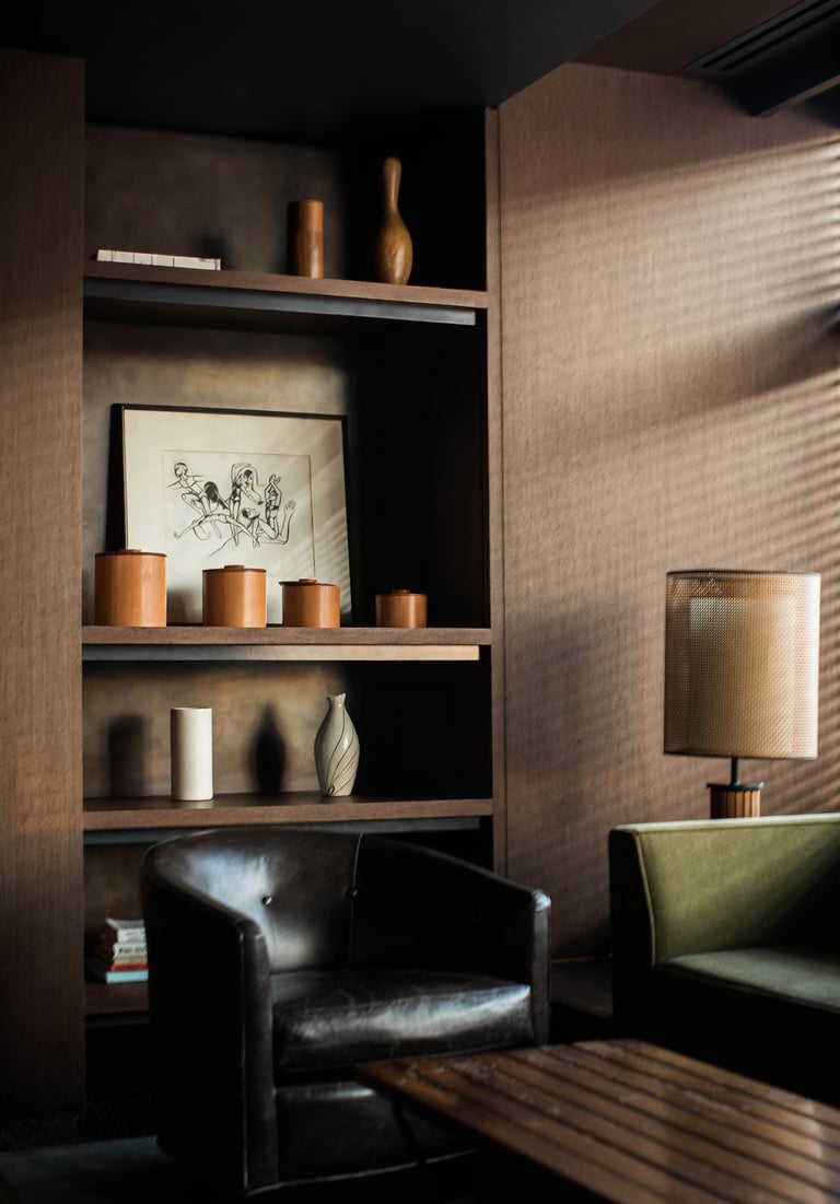 a living room with a couch and a table