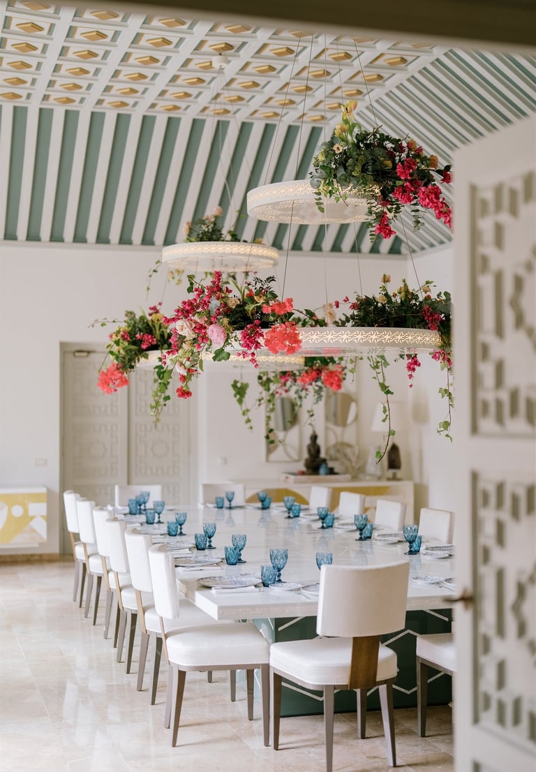 Villa El Rincon dining room with ornate ceilings and floral decor for a wedding