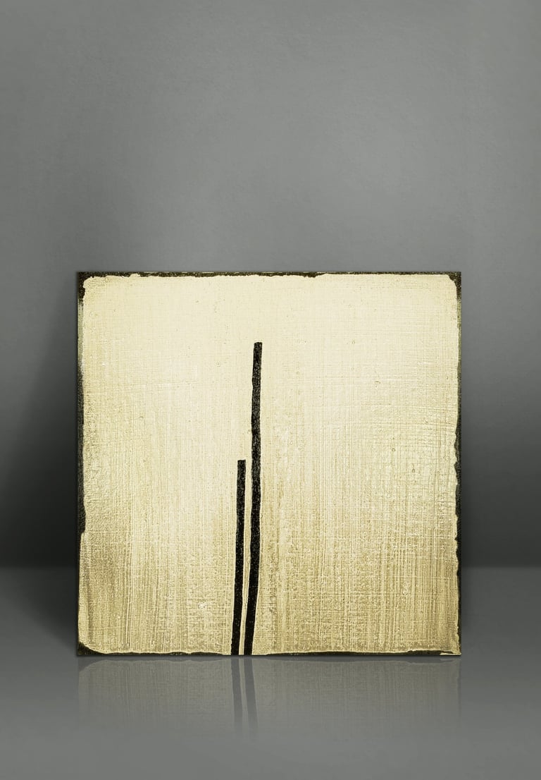 Minimalist square canvas painting with gold metallic texture and two vertical black ink lines.