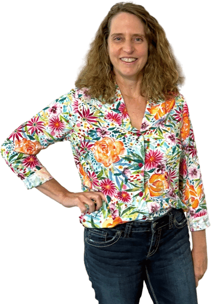 a woman with long hair and a colorful shirt