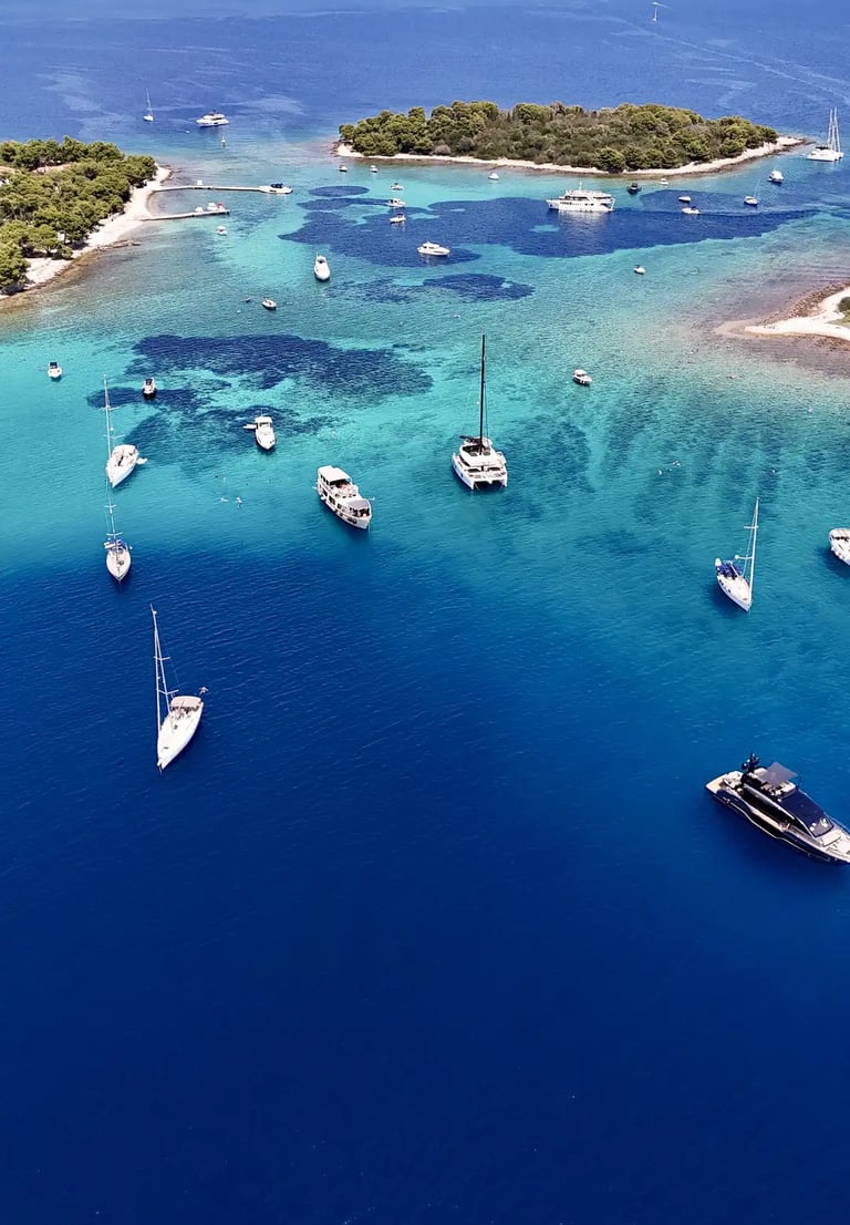 Aerial panoramic view of Blue Lagoon at Drvenik Veliki Island, seen on a private boat tour from Split, Croatia.